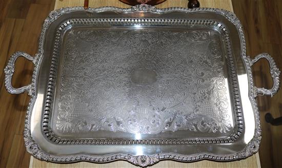 A large plated pierced two-handled tray